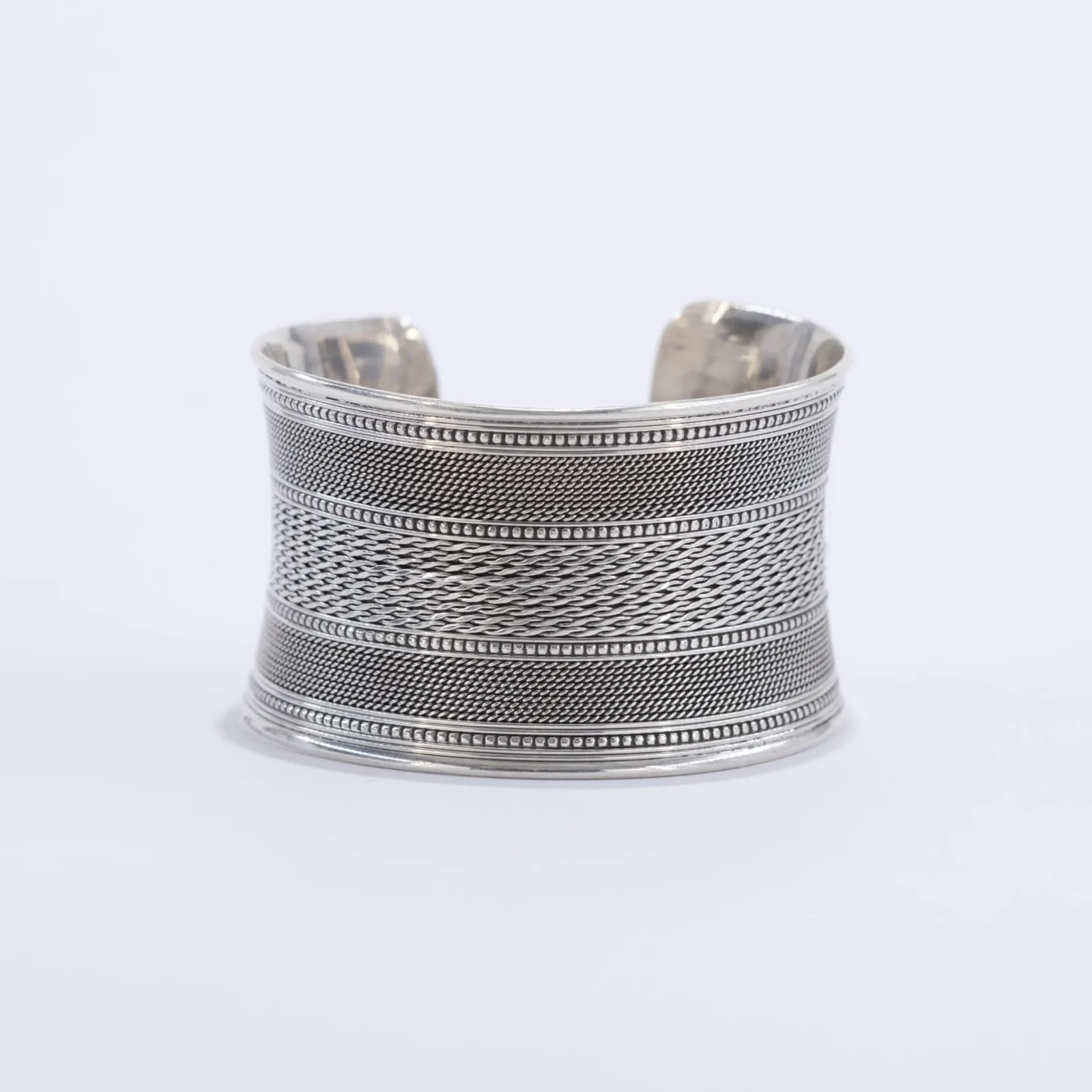 Wide engraved silver bangle