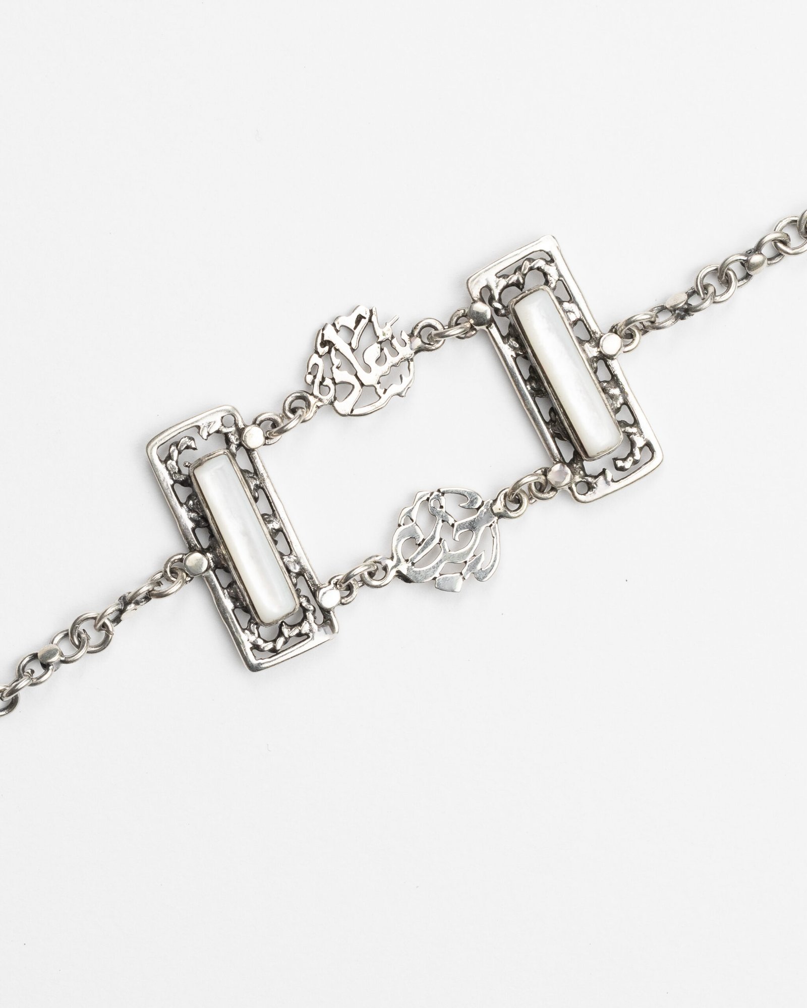 انسيال من الفضه عيار 925 مطعمه بحجر الصدف