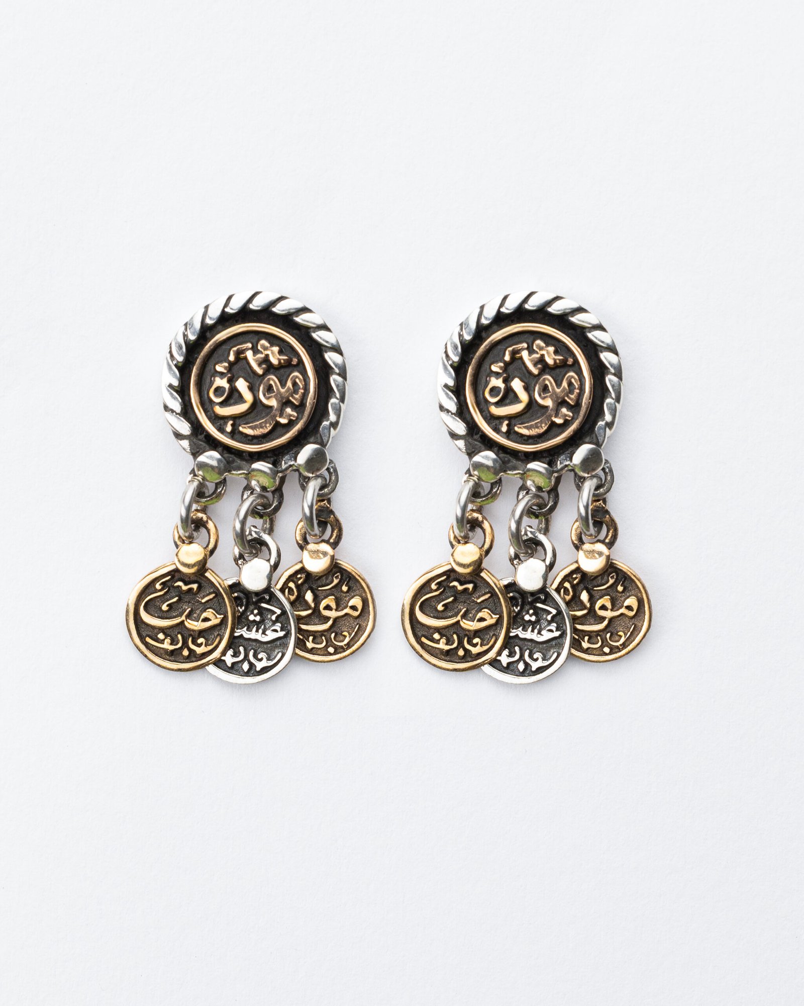 Silver earring Engraved with “موده ”